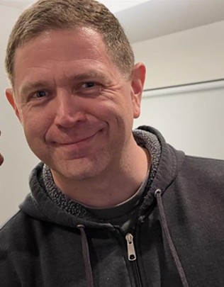 Loren man smiling