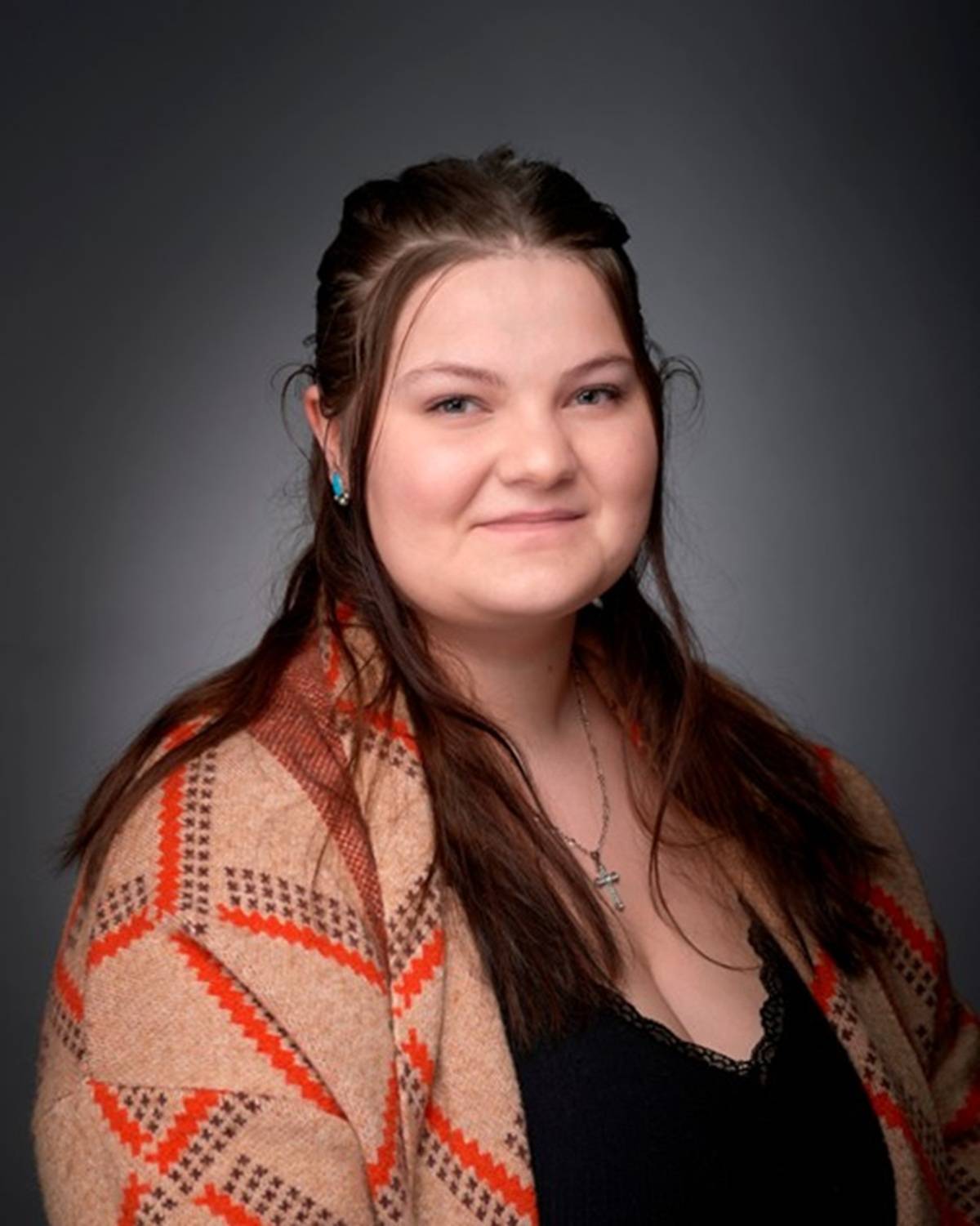 Woman with brown hair smiling