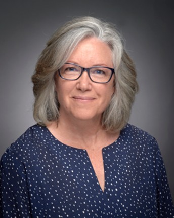 Margie woman smiling with glasses