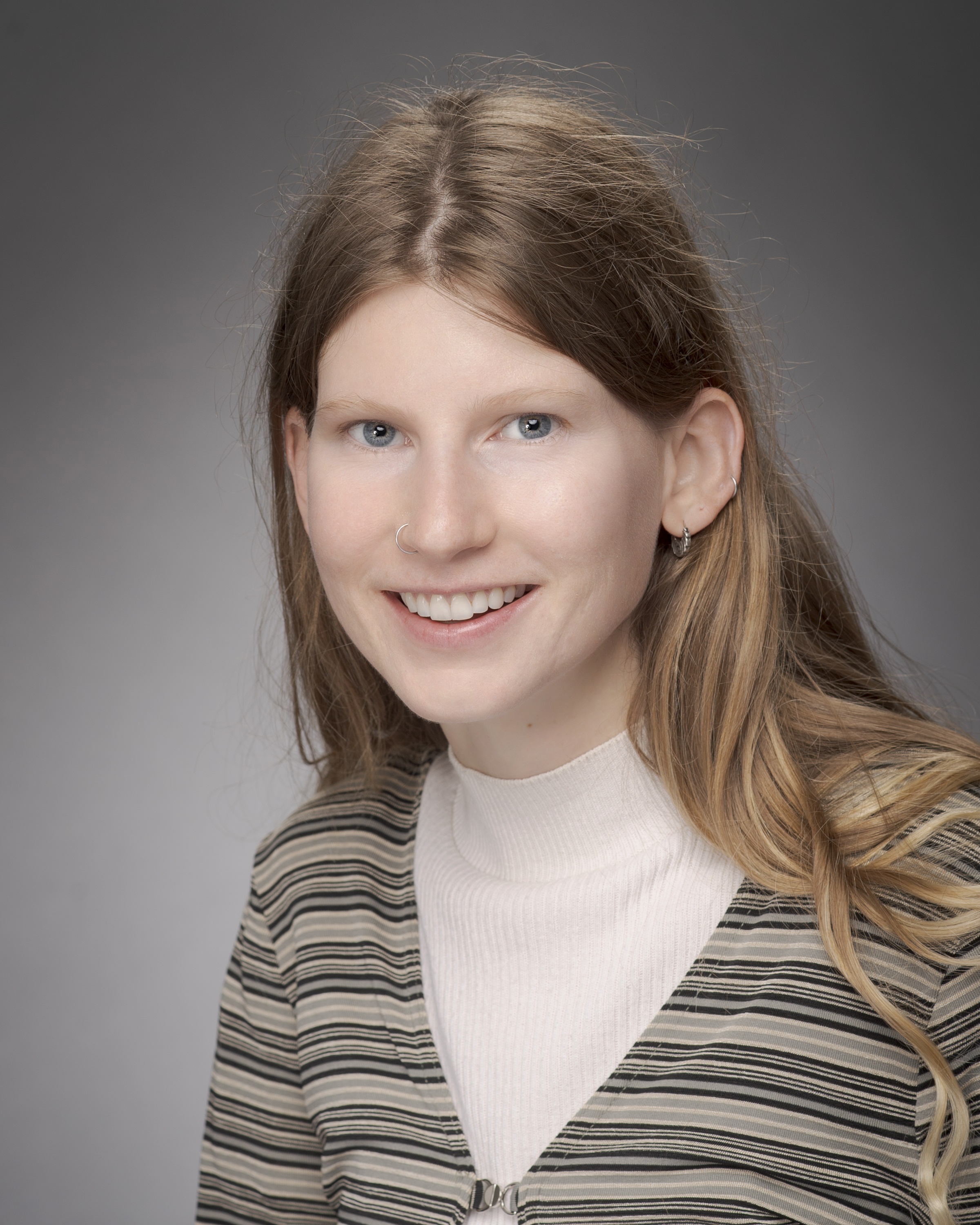 Taylor woman with light brown hair smiling